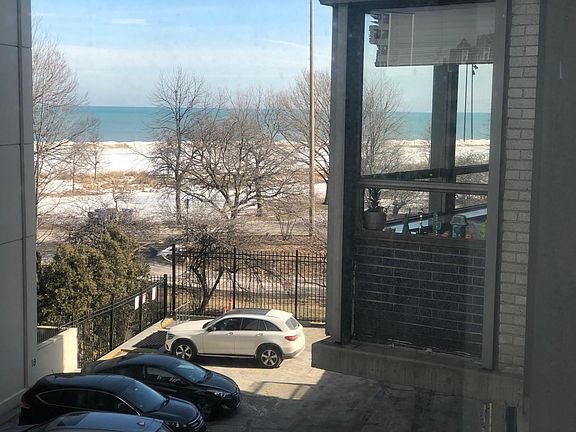 VIEWS OF THE LAKE AND SHERIDAN RD. FROM ALL ROOMS!