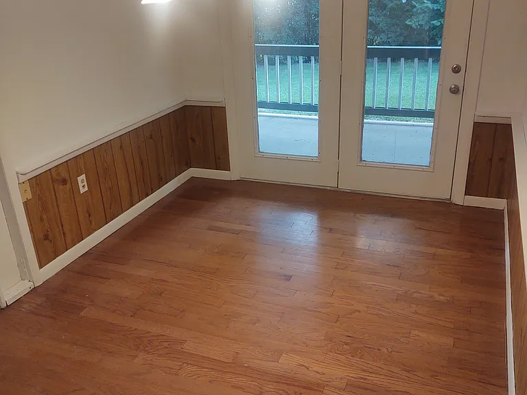 Formal dining room features outdoor views and access.