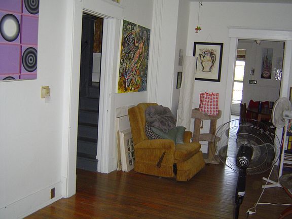 Living room, looking east toward kitchen and dining room