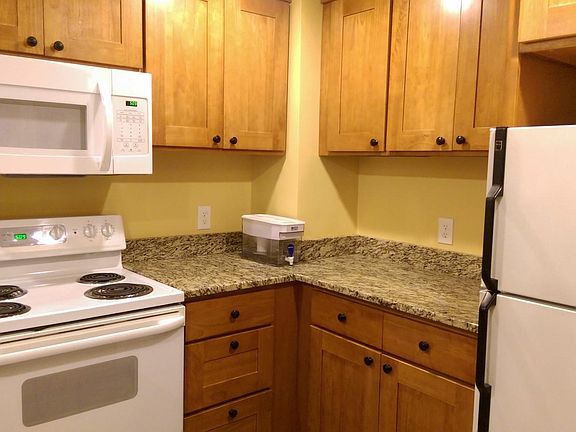 Kitchen with granite counter tops.