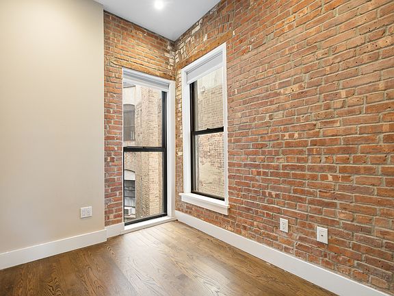 4th image of 61 E 7th St APT 5A