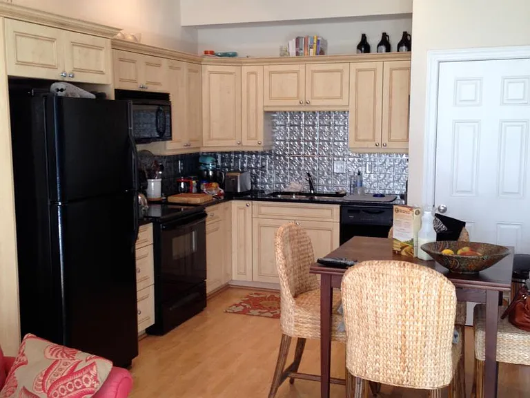 Updated appliances with tin backsplash