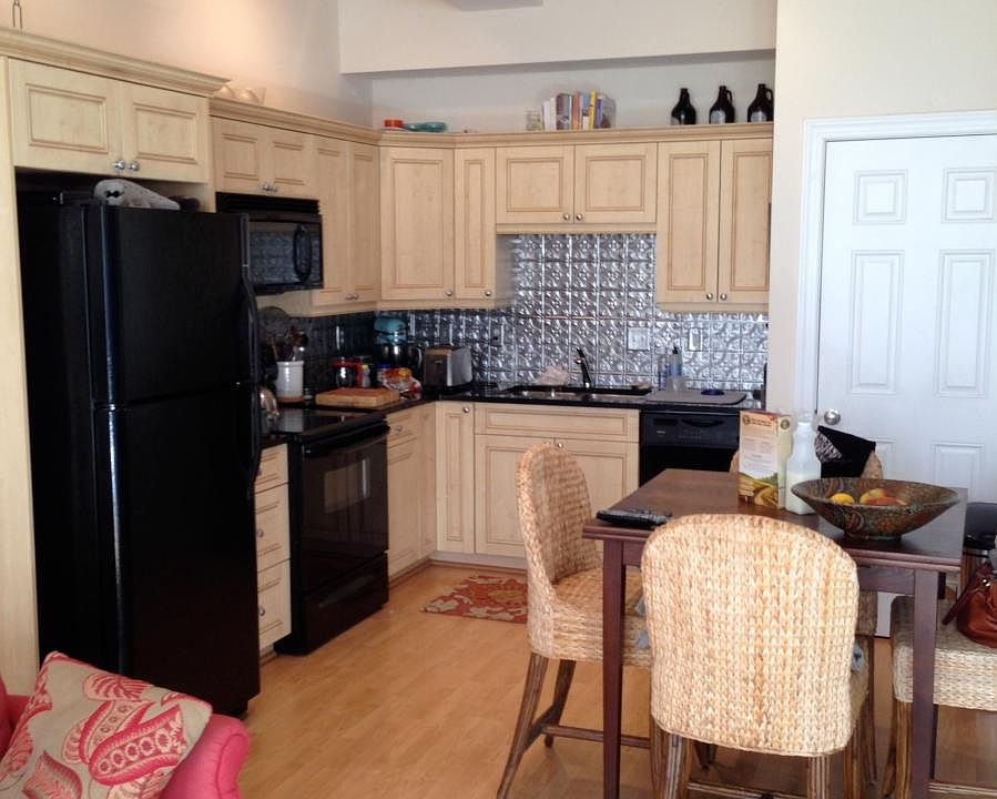 Updated appliances with tin backsplash