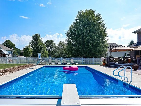 We did say POOL home right!  Gorgeous 
patio and deck area are all set up for fun in the sun! There's still time to enjoy it this summer!
