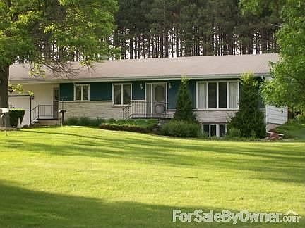 House Front
						:
						Ranch home and front yard