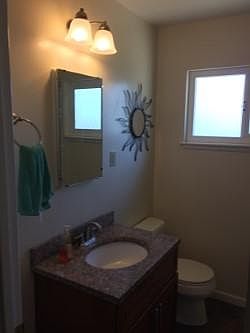 Main hall bath with bathtub.