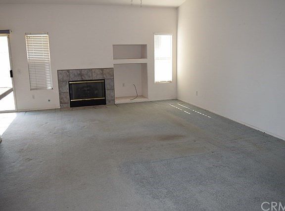 Spacious family room with gas fireplace.