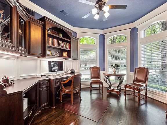 The study has great natural light, sitting area to meet with a client and lots of built-ins. Perfect for a home office.