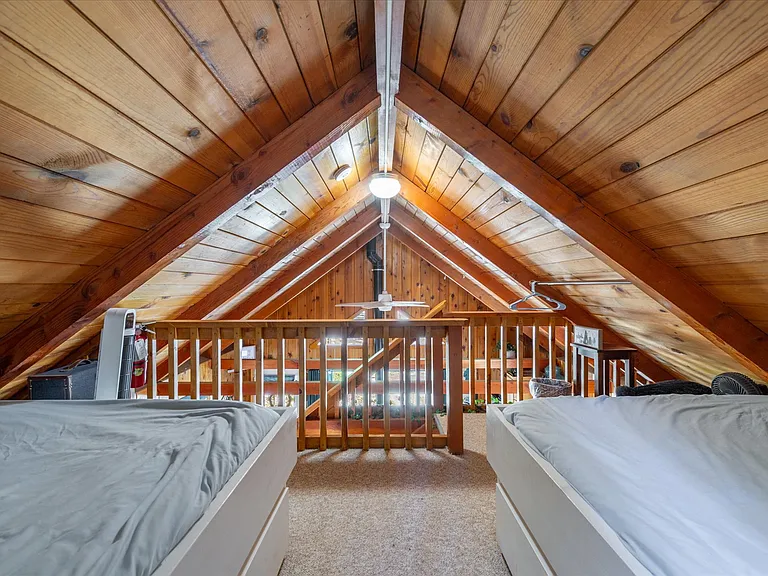 Loft Sleeping Area (upstairs) - 2 full size beds.