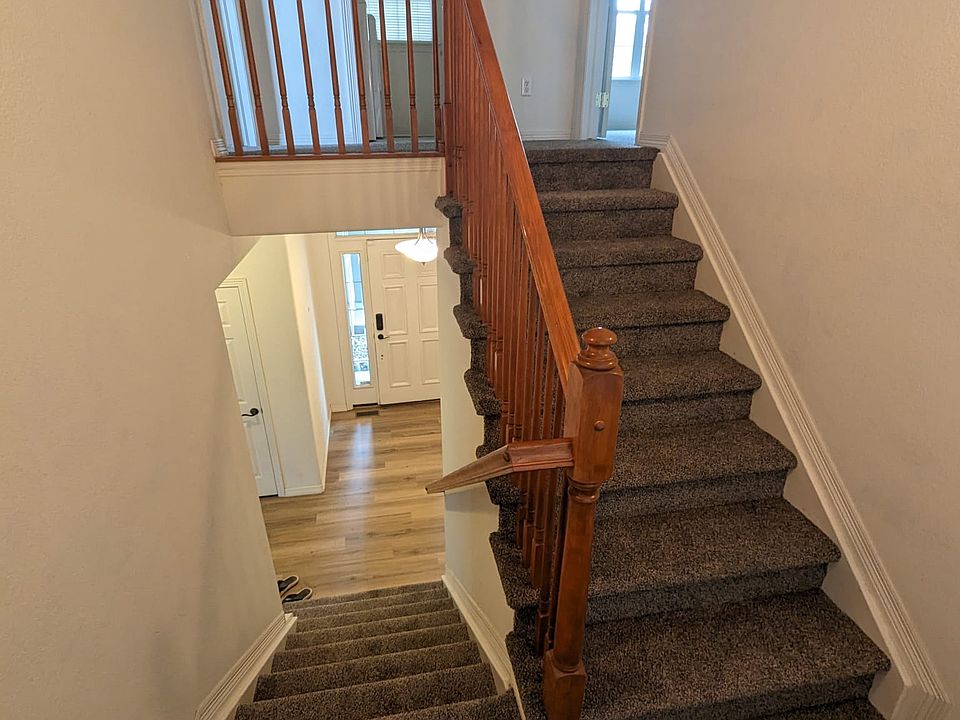 Entry way and stairs to bedrooms with laundry on the same floor