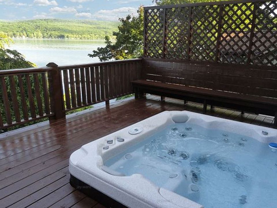 Hot tub within back patio