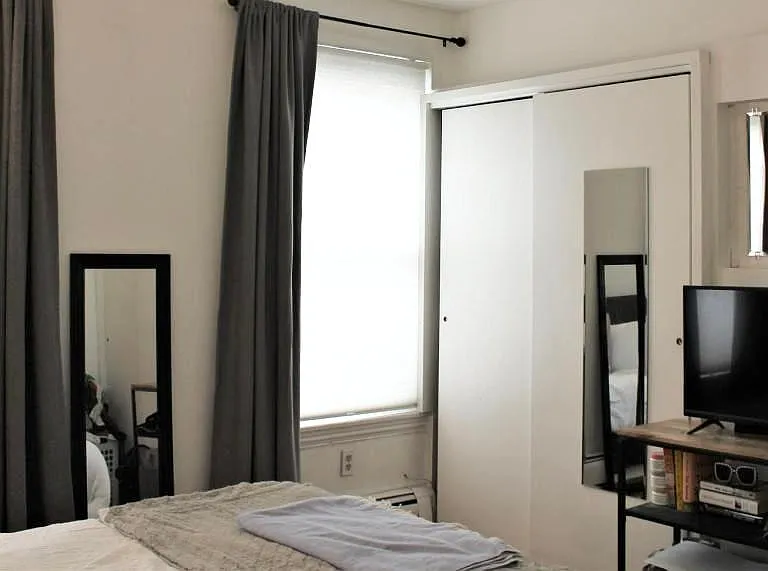 Large 2nd floor bedroom showing closets