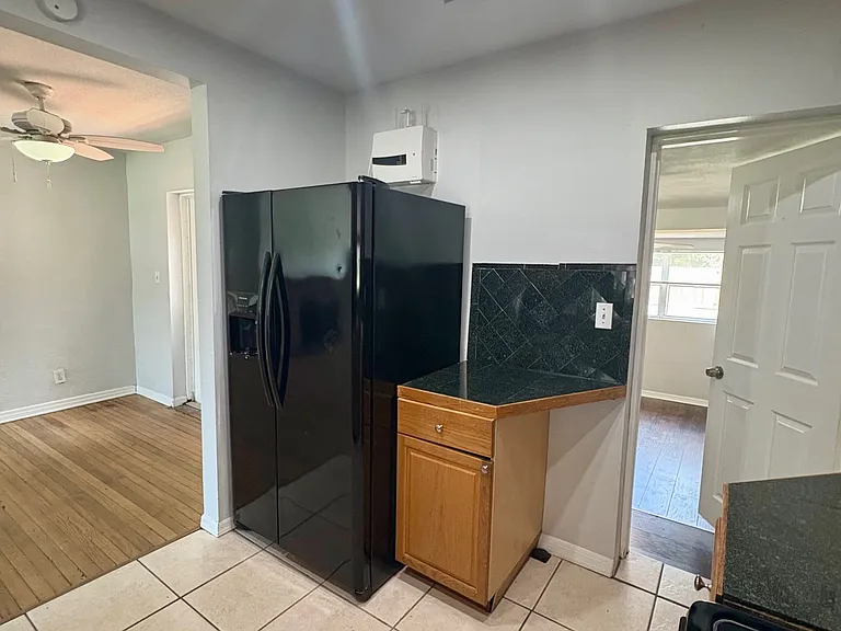 fridge and entry to the master suite