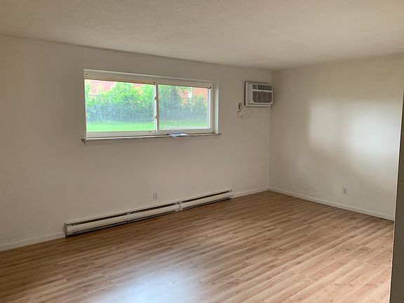 Large living area with laminate floors