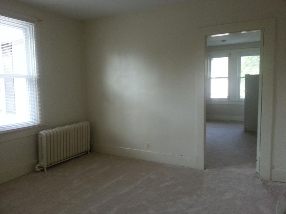 view looking into living room /kitchenette area from bedroom
