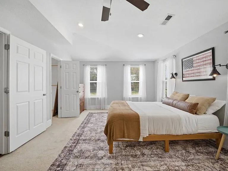 Room 1: Primary bedroom with Queen size bed. Very spacious with walk-in closet and en suite bathroom.