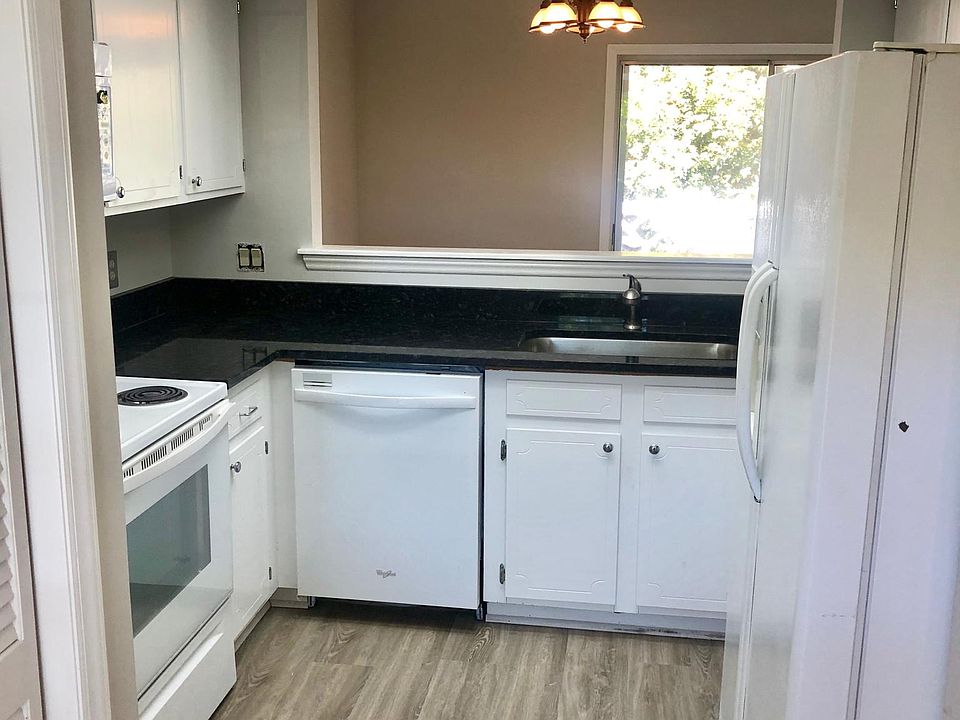 New granite. New faucet. New floors. Microwave. Refrigerator water ice in door