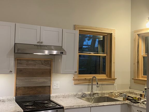 Kitchen Area / Fridge is to the right.