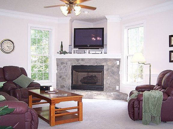 Family Room with Beautiful Stone Fireplace