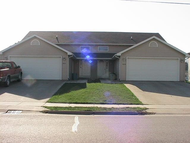 Front view. Attached double garage.