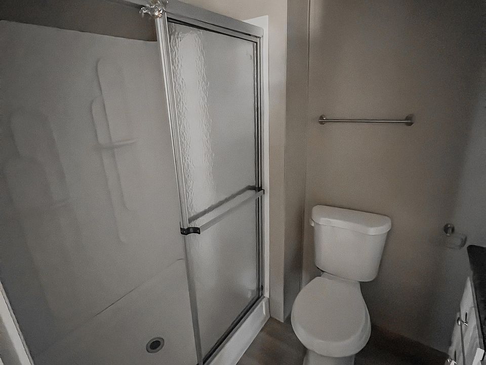 Modern ensuite bathroom with sleek finishes and a walk-in shower for everyday comfort.