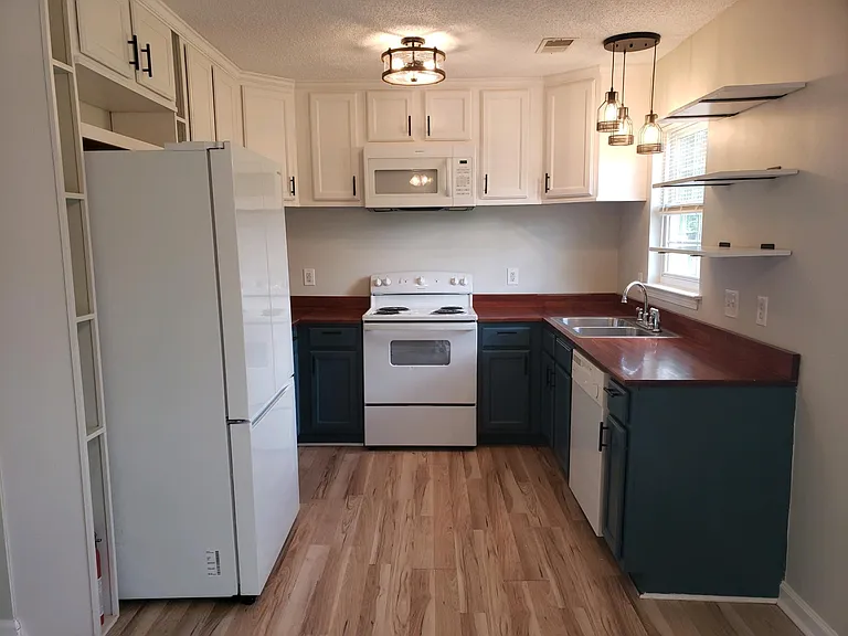 Microwave, stove and counter depth refrigerator are one year old