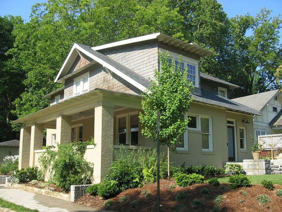 Classic 1920's Midtown renovation graciously nestled on a corner lot.