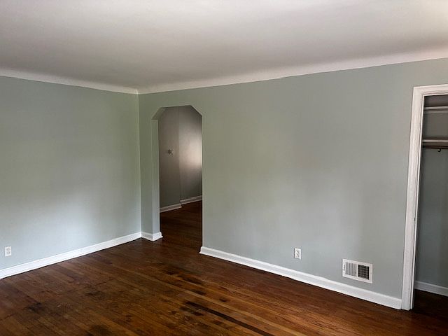 Living room showing doorway into the dining room and with living room closet