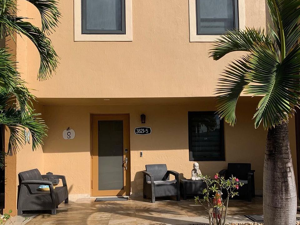 Front porch of the Townhouse with view of your Parking spaces.