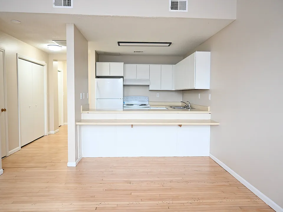 Kitchen with white cabinets.