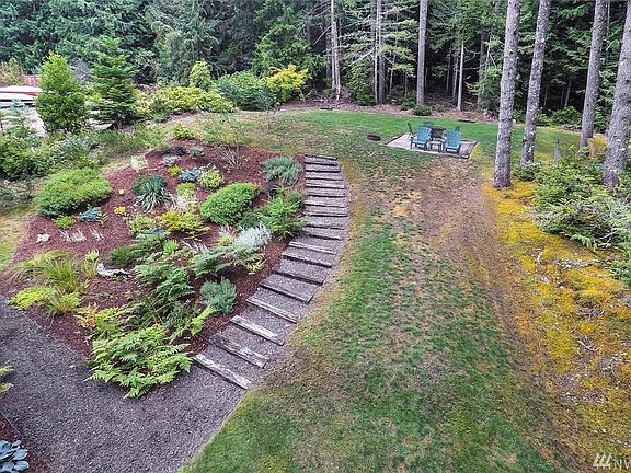 Northwest style pathway leading to a quaint sitting area to take in the views!