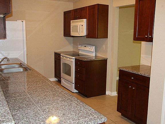 Tile Counter tops,kitchen cabinets,,tile floors updated 2008