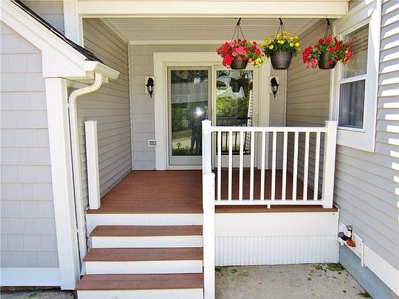 Front Porch has Composite Decking and Vinyl Railings for Low Maintenance! Anderson Slider Leads to the Dining Area Giving it Lot