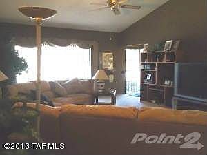 Living Room looking to Front Entrance Go