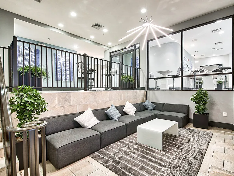 The modern building lobby welcomes you home