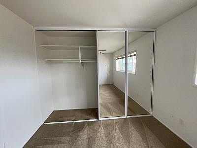 Extra dep wall to wall wardrobe closets.