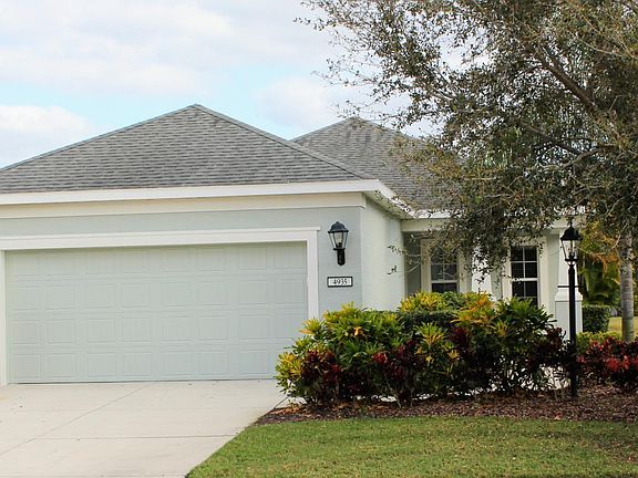 Landscapers come weekly to maintain grass, bushes and trees.