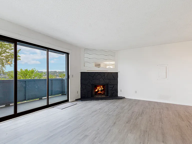 Bright spacious living with big sliding door to private deck