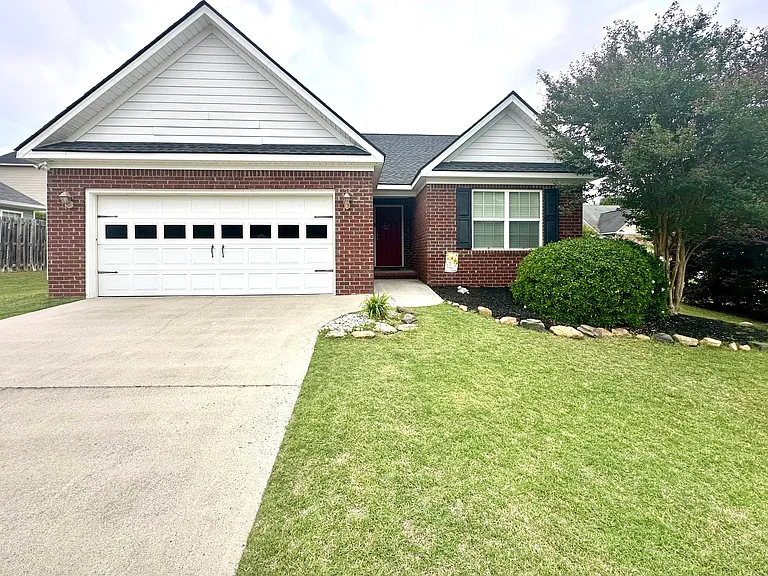 877 Tyler Woods Dr — Photo 1