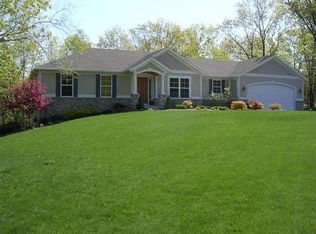 8718 Camelot Ave NE, Rockford, MI 49341