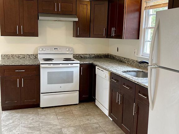 First-floor Kitchen with granite countertops