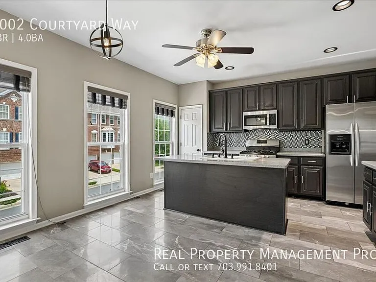 7002 Courtyard Way — Photo 15