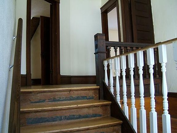 entrance now steps painted in the risers. gate to the right is removed...