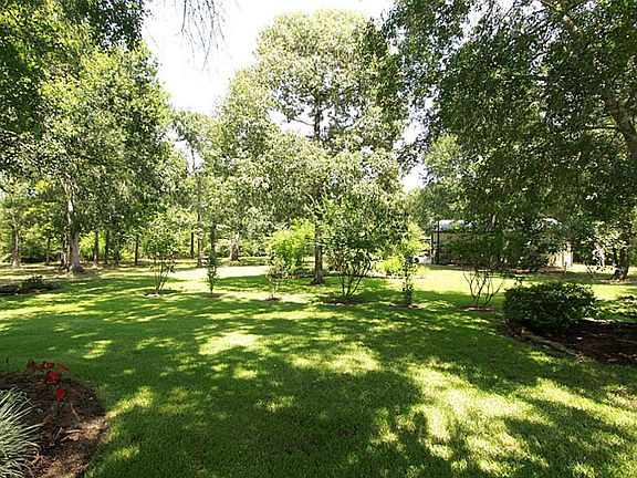  The park-like setting that surrounds the home features a 17 station sprinkler system with expansion slots and a booster pump.
