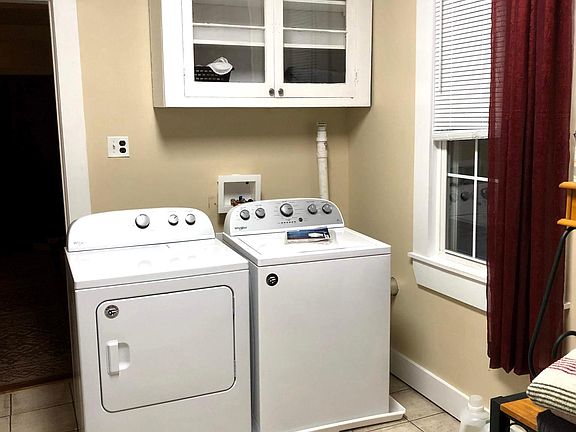 Washer and dryer hookups are in the kitchen (washer and dryer in photo belong to current tenant).