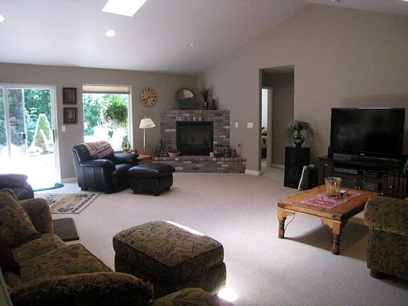 This wonderful home is styled around the "Great Room" concept with many custom features.