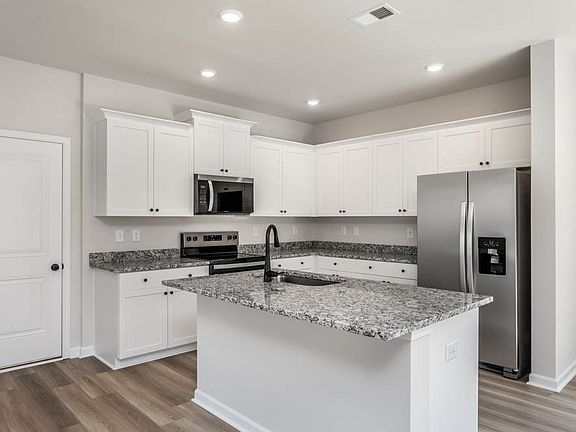 Each kitchen comes with stainless steel appliances.