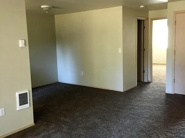 Livingroom, dining to the left, main bathroom and master bedroom entrance and part of hall closet