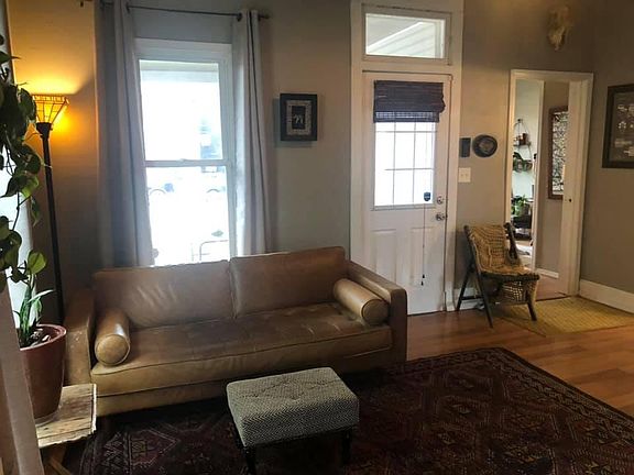 Living Room and front door looking from kitchen