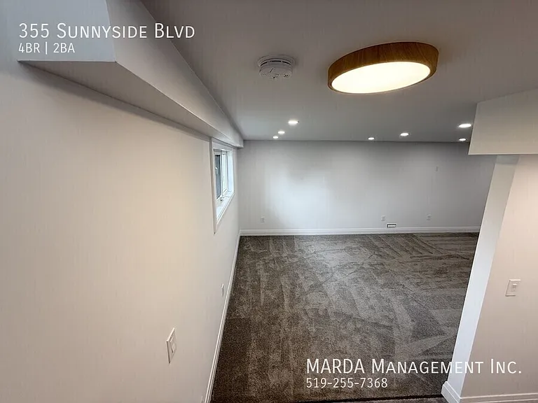 355 Sunnyside Blvd — Photo 41